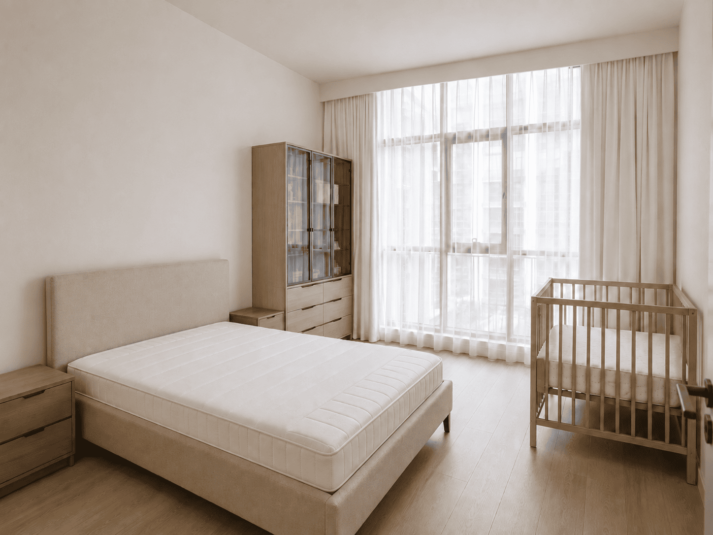 Second bedroom renovation with bed, wooden cot and glazed wardrobe cabinet in Park Heights apartment, Dubai