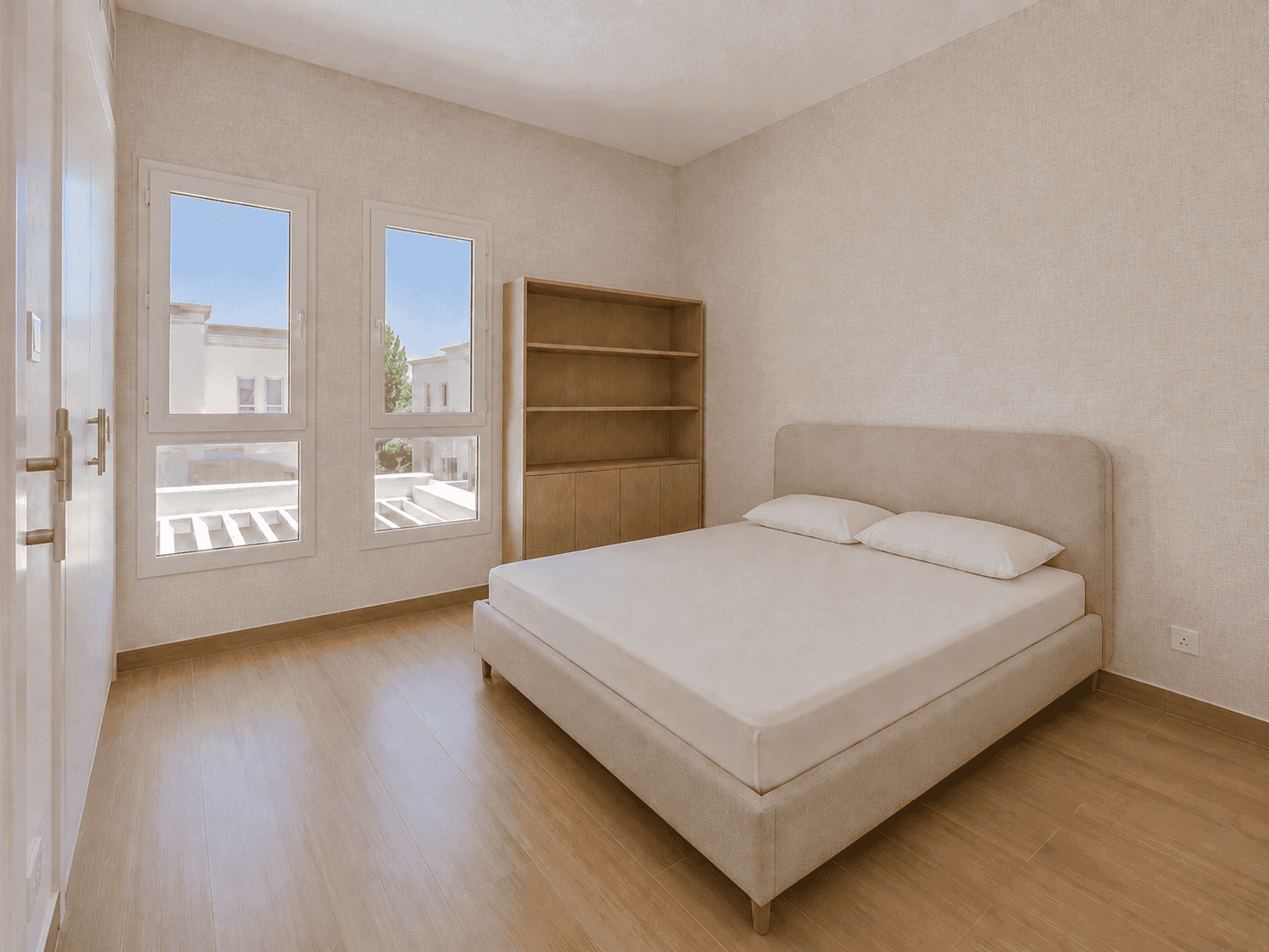 Third bedroom renovation with oak bookshelf, built-in wardrobes and terrace-view windows in The Lakes villa