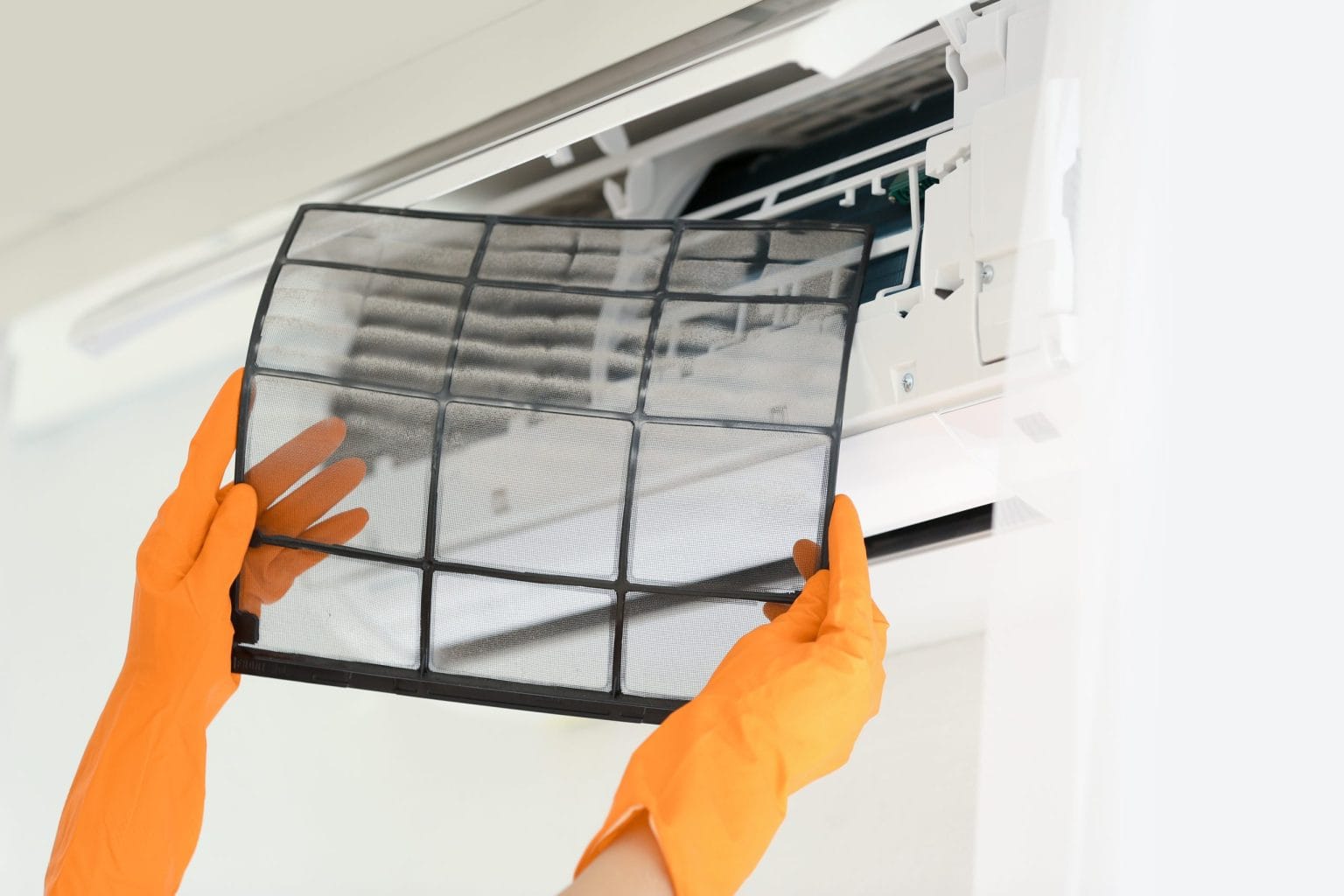 Removing the filter mesh from a split air conditioning unit