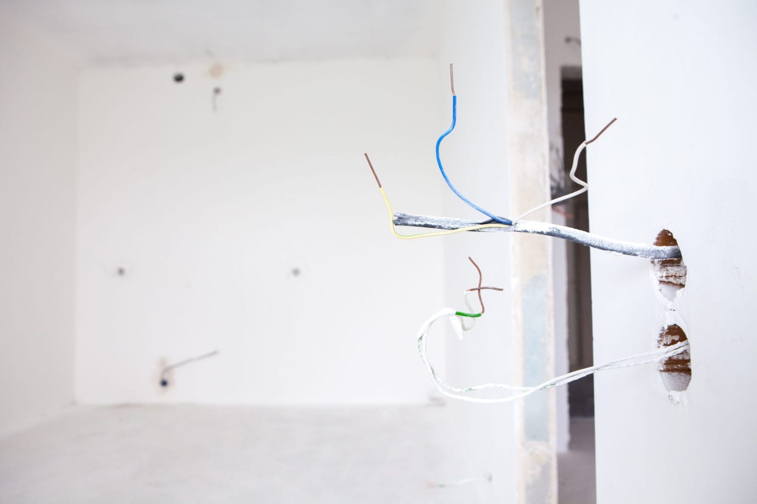 Cable tails left at a back box before second fix