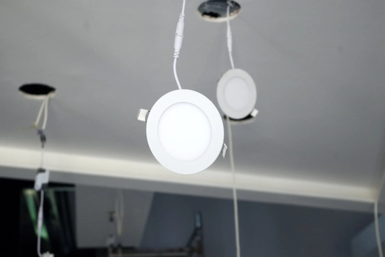 Recessed downlights installed in a suspended ceiling