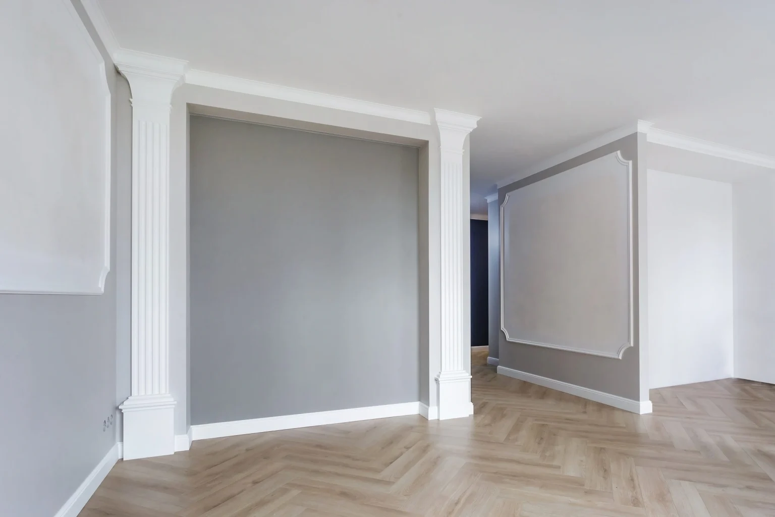 Gypsum boxing forming a recessed niche and framed opening in a Dubai apartment