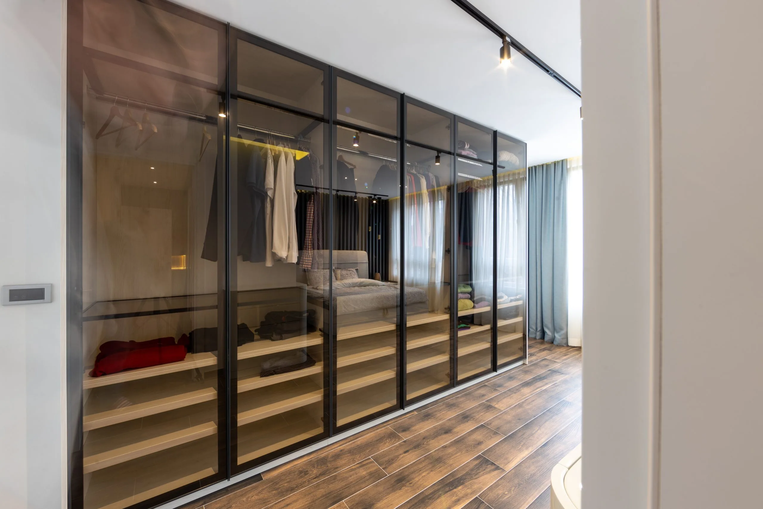 Walk-In Wardrobe with Smoked-Glass Doors