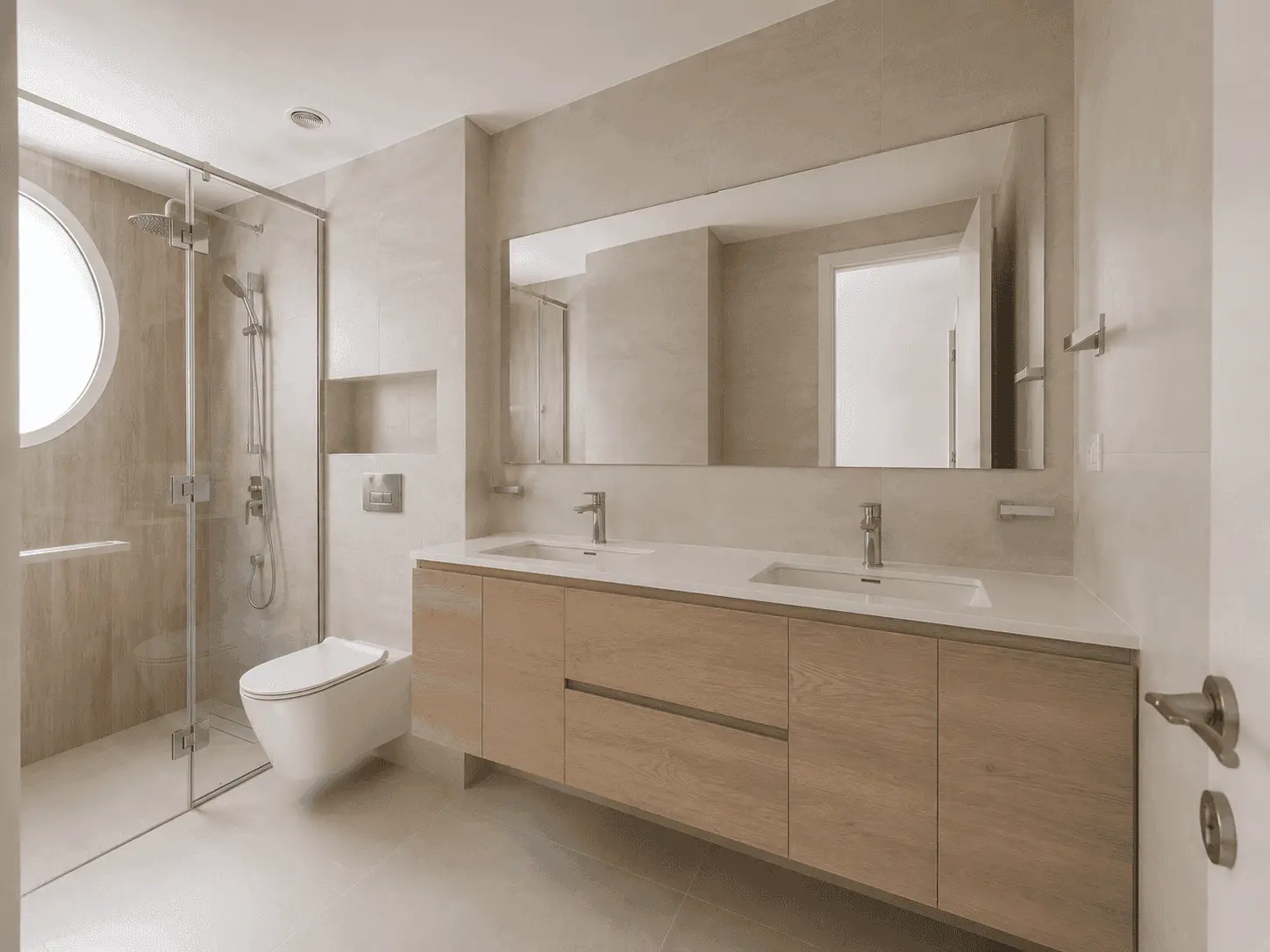 Master bathroom renovation with double oak vanity, wide mirror and walk-in shower in The Lakes villa, Dubai