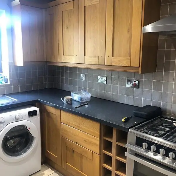 Dated oak kitchen before renovation