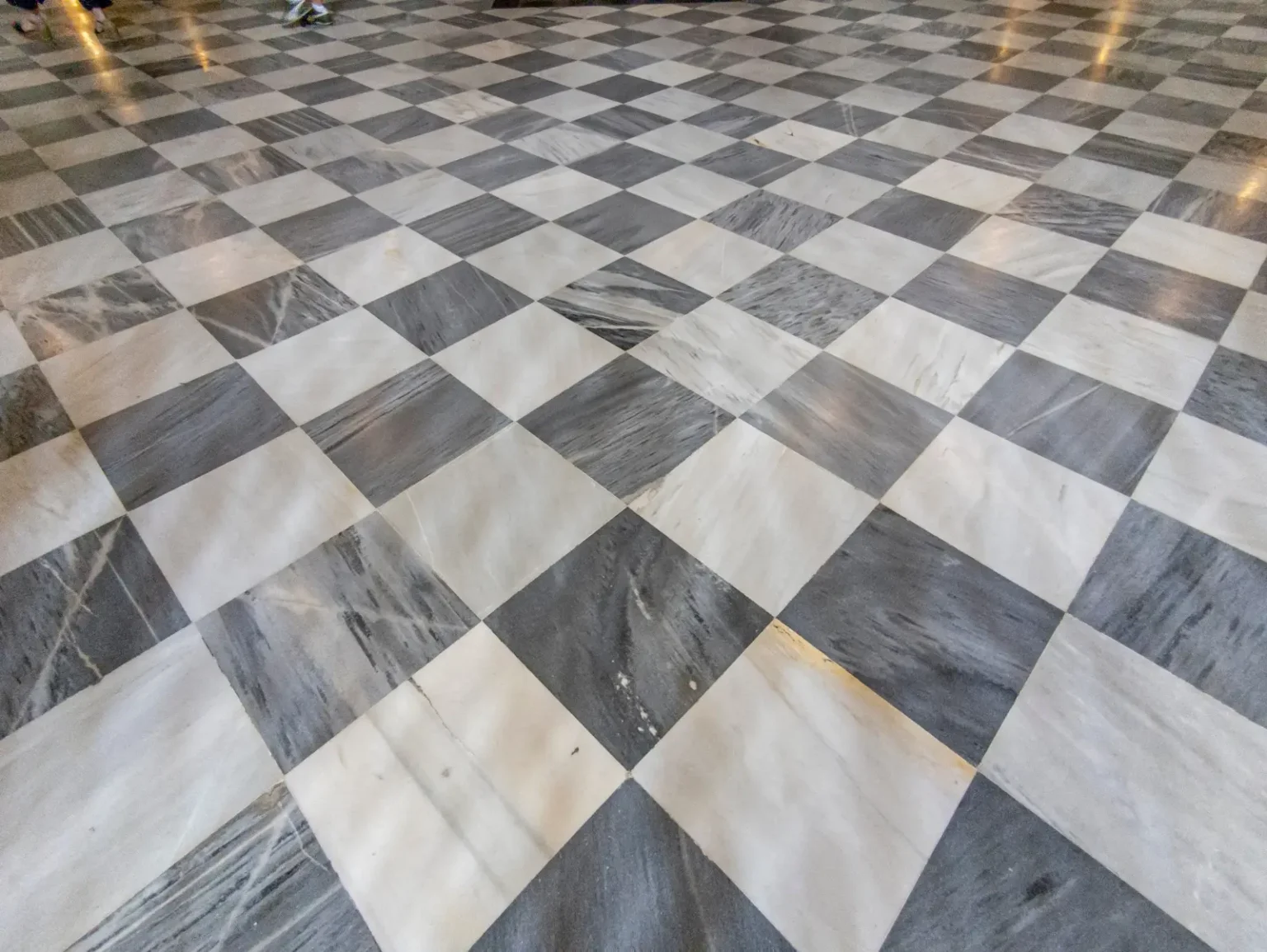 Polished marble flooring in a Dubai lobby installed by a marble flooring contractor