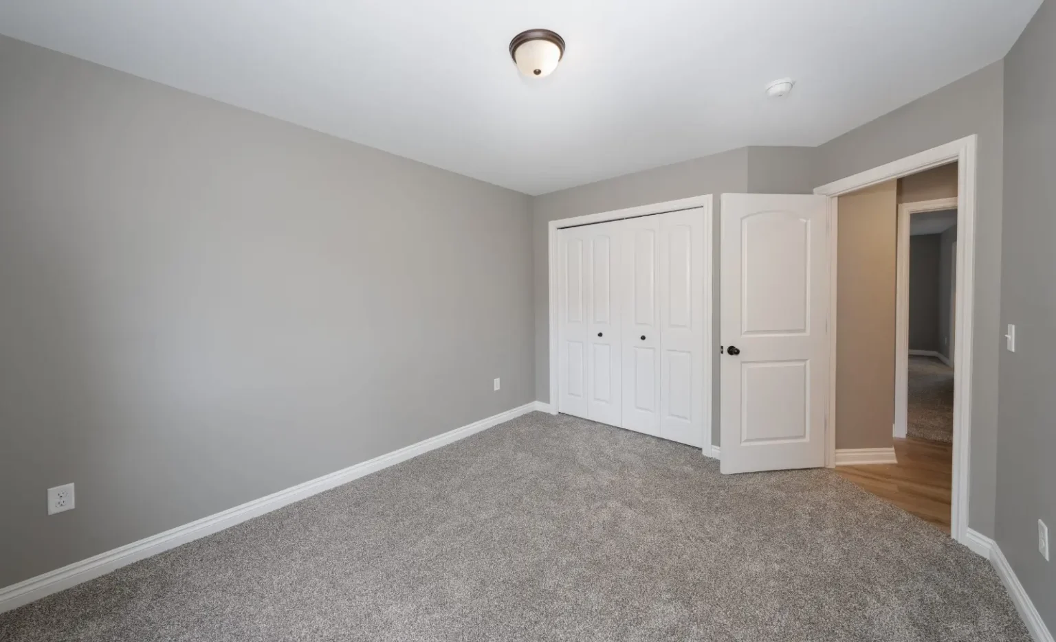 Soft bedroom carpet flooring fitted in a Dubai apartment
