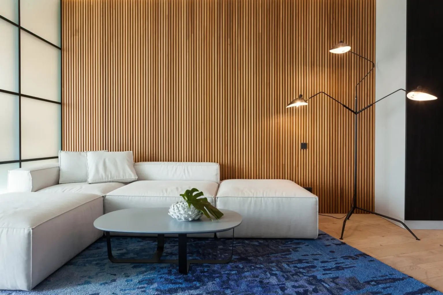 Timber slat acoustic feature wall built as a media wall by a joinery company in Dubai
