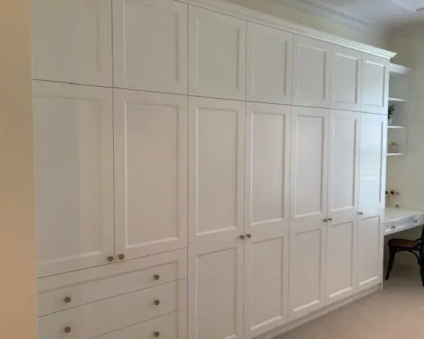 Plain white built-in wardrobe before renovation